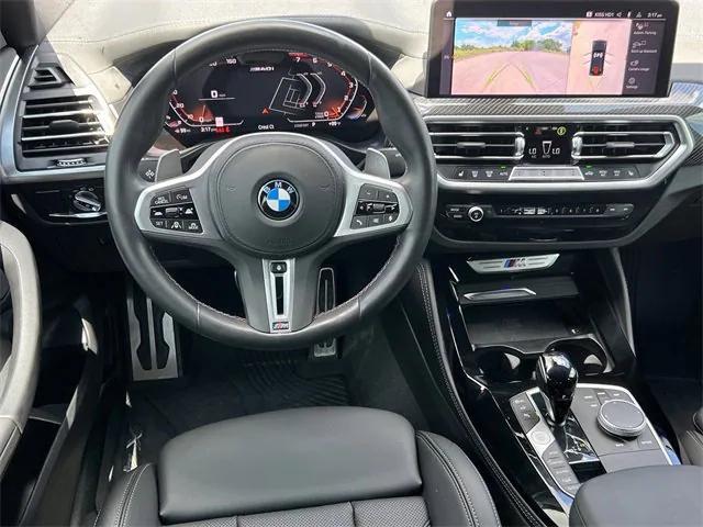 used 2023 BMW X4 car, priced at $53,999
