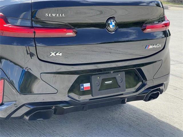 used 2023 BMW X4 car, priced at $55,488