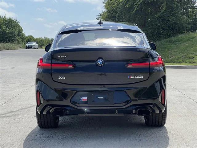 used 2023 BMW X4 car, priced at $55,488