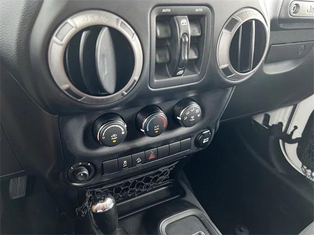 used 2015 Jeep Wrangler Unlimited car, priced at $17,413