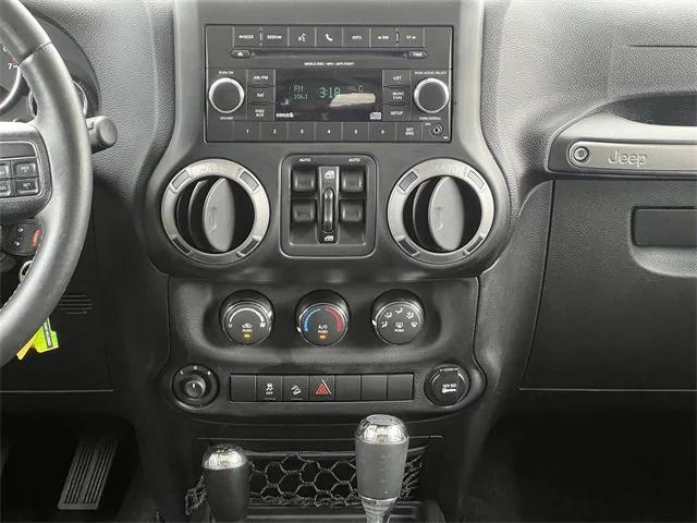 used 2015 Jeep Wrangler Unlimited car, priced at $17,413