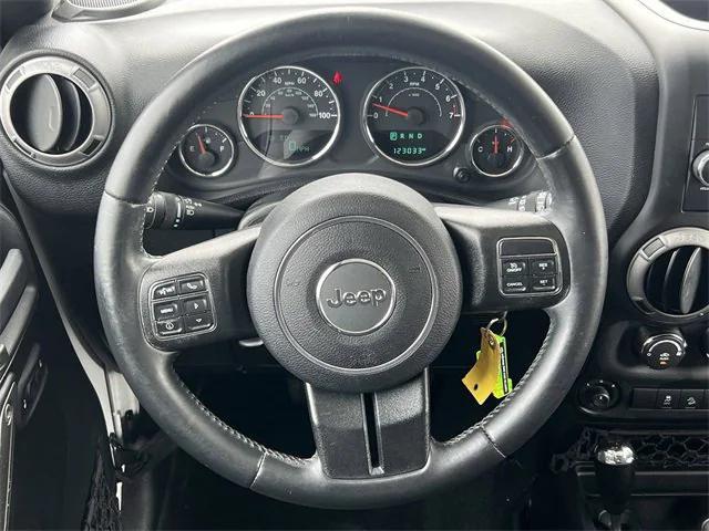 used 2015 Jeep Wrangler Unlimited car, priced at $17,413