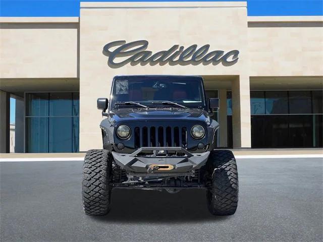 used 2015 Jeep Wrangler Unlimited car, priced at $25,871