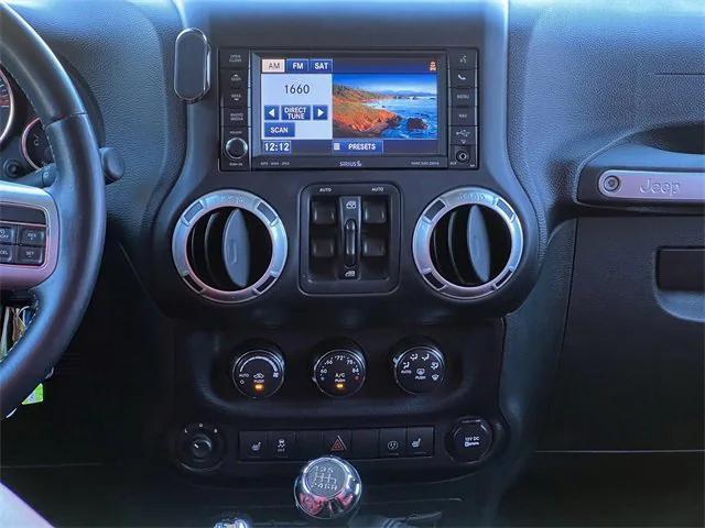 used 2015 Jeep Wrangler Unlimited car, priced at $25,871