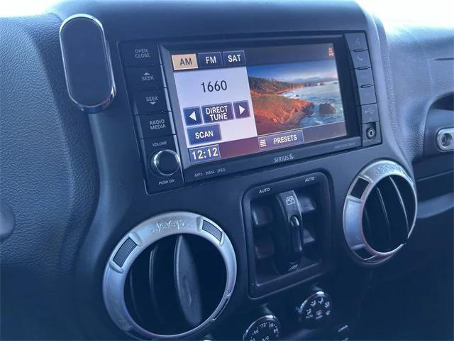 used 2015 Jeep Wrangler Unlimited car, priced at $25,871