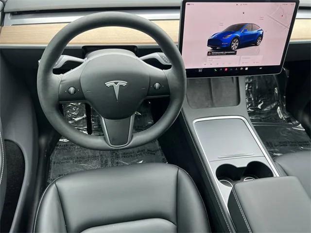 used 2023 Tesla Model Y car, priced at $32,837