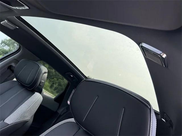 new 2025 Cadillac OPTIQ car, priced at $56,215