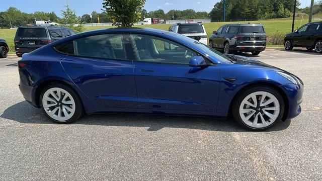 used 2023 Tesla Model 3 car, priced at $27,995