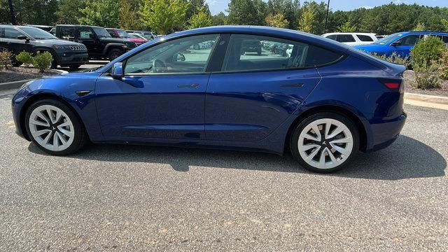 used 2023 Tesla Model 3 car, priced at $27,995