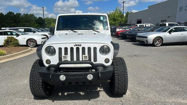 used 2012 Jeep Wrangler Unlimited car, priced at $13,995