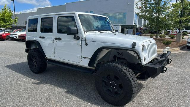 used 2012 Jeep Wrangler Unlimited car, priced at $13,995