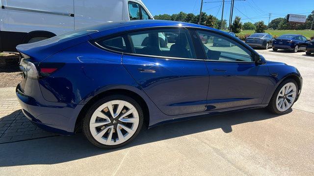 used 2022 Tesla Model 3 car, priced at $17,495