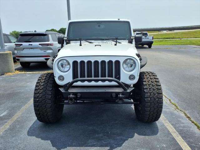 used 2014 Jeep Wrangler Unlimited car, priced at $18,777