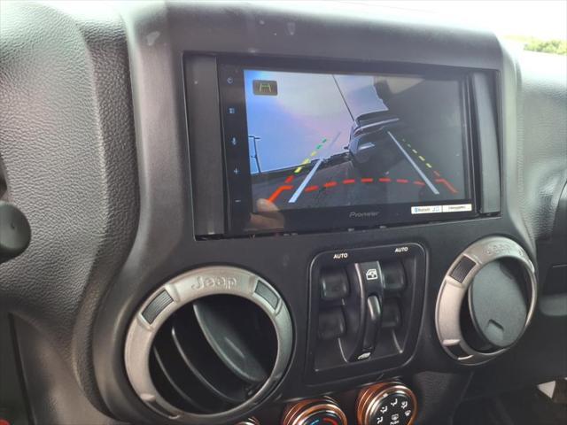 used 2014 Jeep Wrangler Unlimited car, priced at $18,777