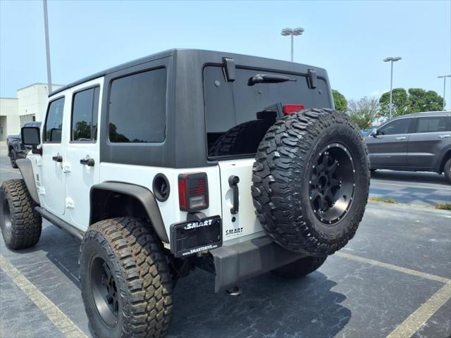 used 2014 Jeep Wrangler Unlimited car, priced at $18,777