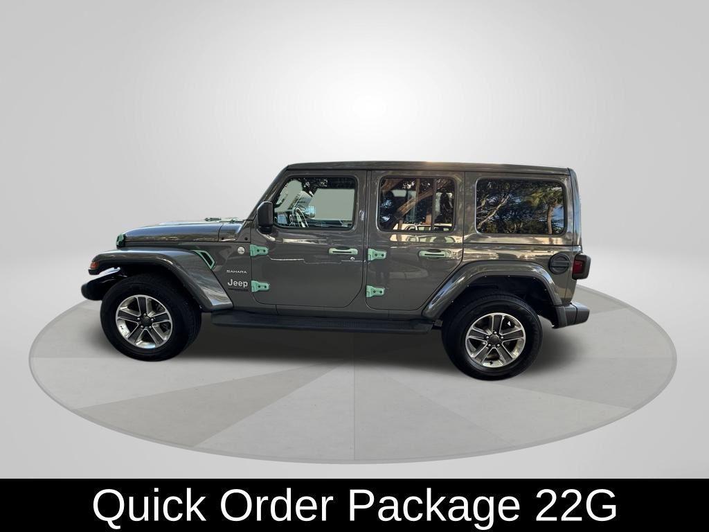 used 2021 Jeep Wrangler Unlimited car, priced at $30,372