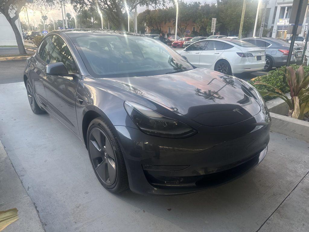 used 2023 Tesla Model 3 car, priced at $28,000