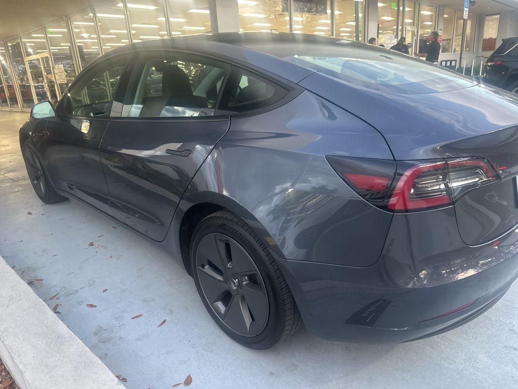 used 2023 Tesla Model 3 car, priced at $28,000