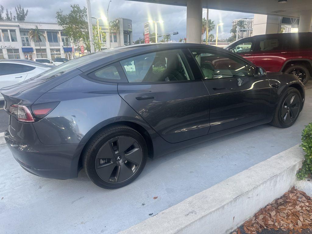 used 2023 Tesla Model 3 car, priced at $28,000