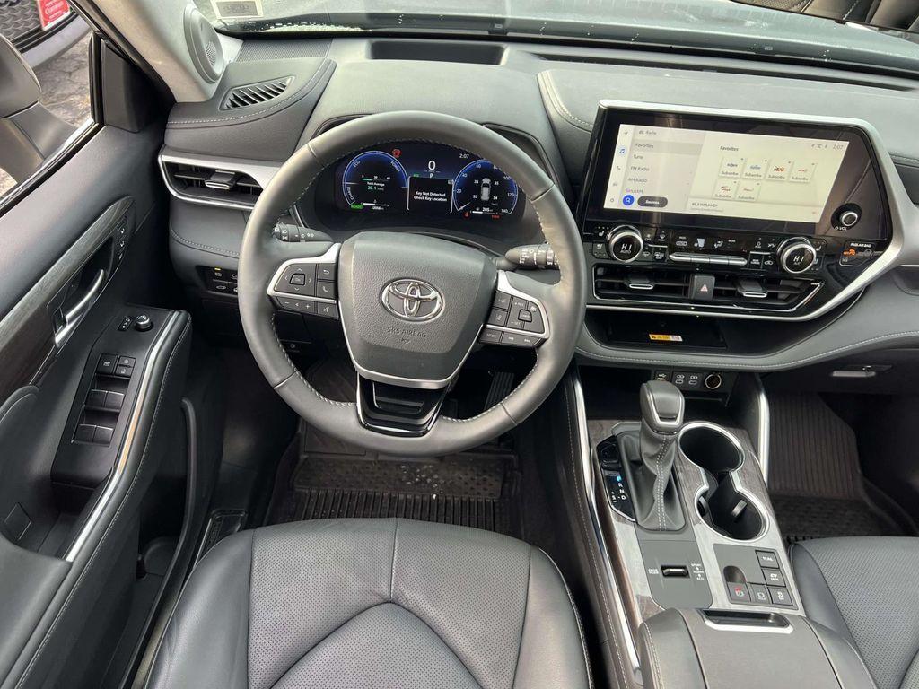 used 2024 Toyota Highlander Hybrid car, priced at $52,995