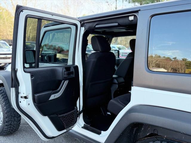 used 2015 Jeep Wrangler Unlimited car, priced at $15,991