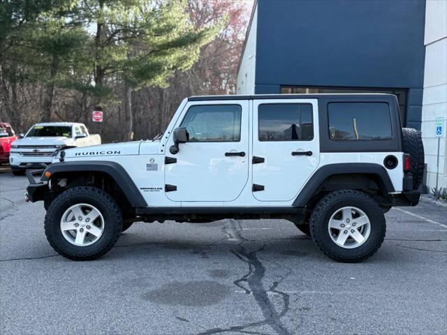 used 2015 Jeep Wrangler Unlimited car, priced at $15,991