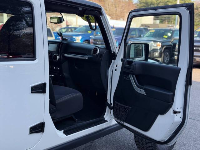 used 2015 Jeep Wrangler Unlimited car, priced at $15,991