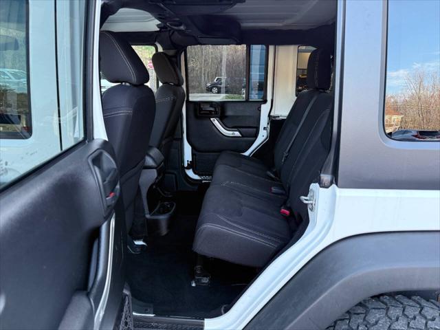 used 2015 Jeep Wrangler Unlimited car, priced at $15,991