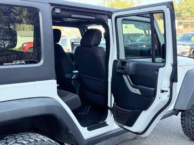 used 2015 Jeep Wrangler Unlimited car, priced at $15,991