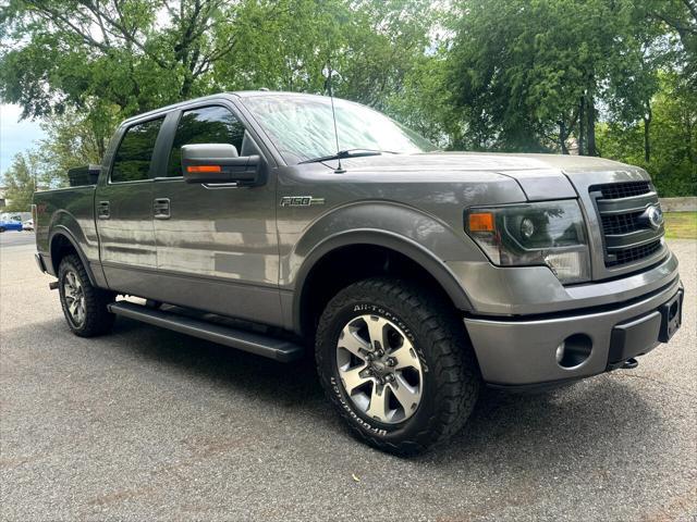 used 2014 Ford F-150 car, priced at $16,495