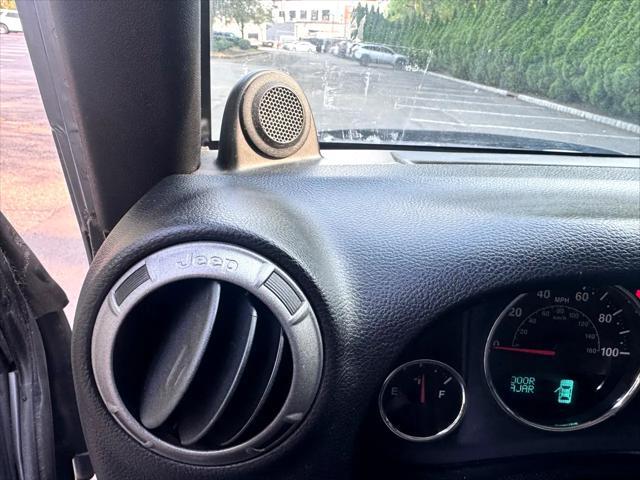 used 2014 Jeep Wrangler Unlimited car, priced at $14,795