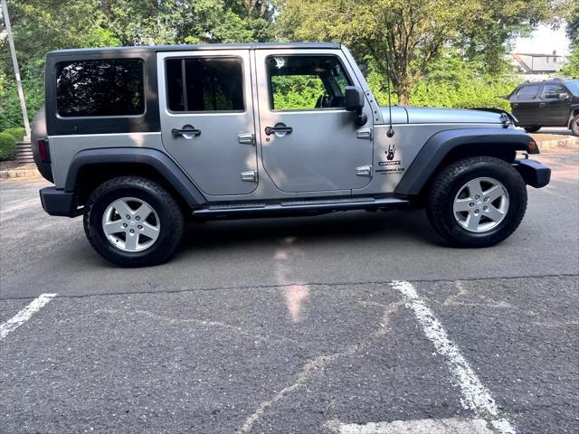 used 2014 Jeep Wrangler Unlimited car, priced at $14,795