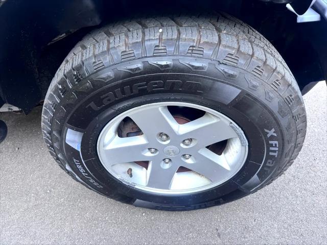 used 2014 Jeep Wrangler Unlimited car, priced at $14,795