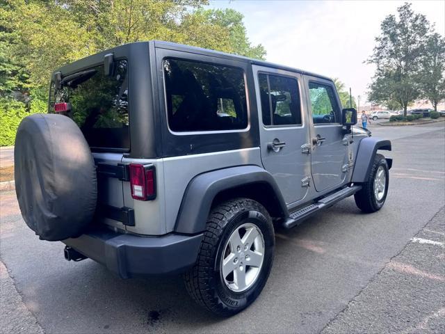 used 2014 Jeep Wrangler Unlimited car, priced at $14,795