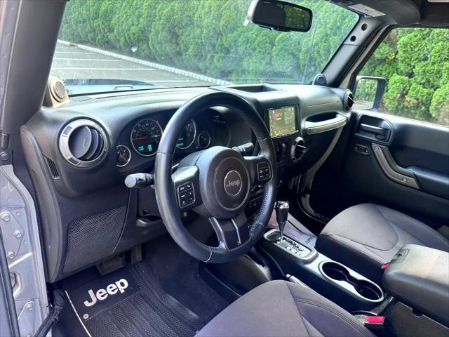 used 2014 Jeep Wrangler Unlimited car, priced at $14,795
