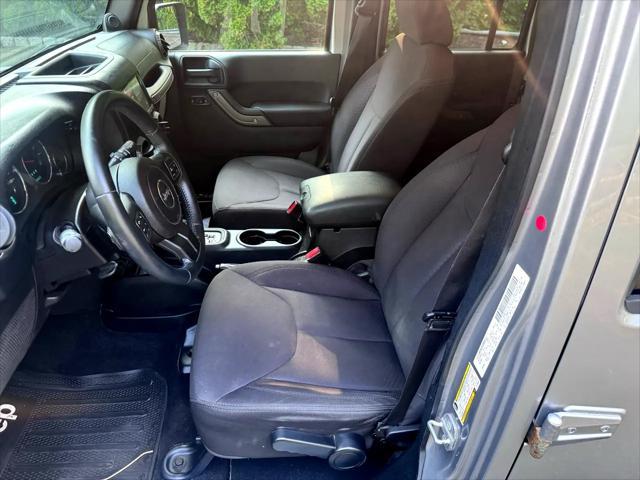 used 2014 Jeep Wrangler Unlimited car, priced at $14,795