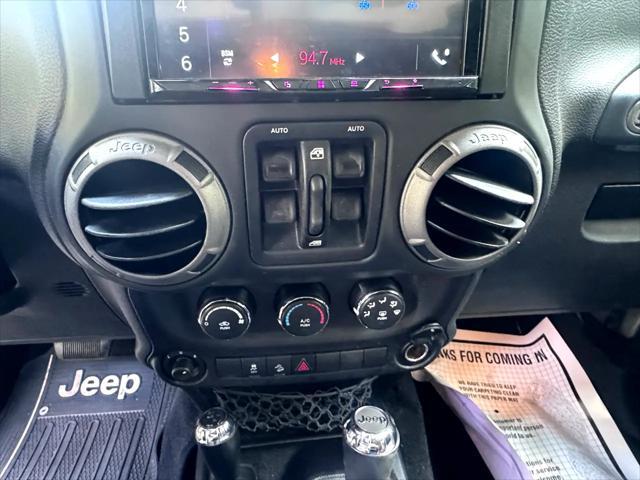 used 2014 Jeep Wrangler Unlimited car, priced at $14,795