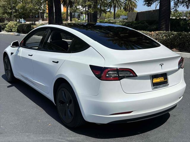 used 2023 Tesla Model 3 car, priced at $20,990