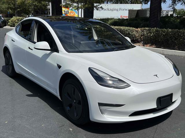 used 2023 Tesla Model 3 car, priced at $20,990