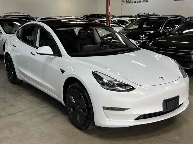 used 2023 Tesla Model 3 car, priced at $20,990