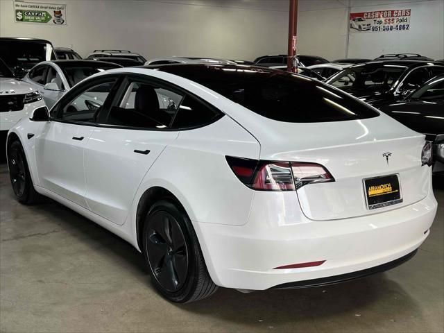 used 2023 Tesla Model 3 car, priced at $20,990