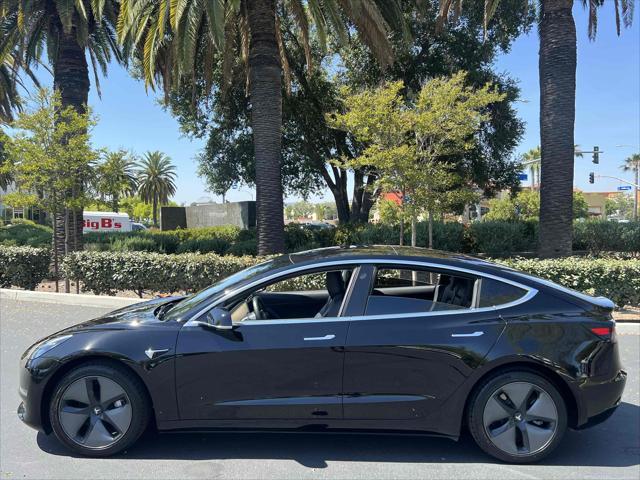used 2018 Tesla Model 3 car, priced at $15,990