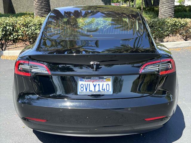 used 2018 Tesla Model 3 car, priced at $15,990