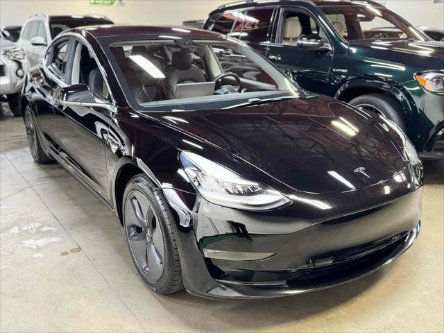 used 2018 Tesla Model 3 car, priced at $15,990