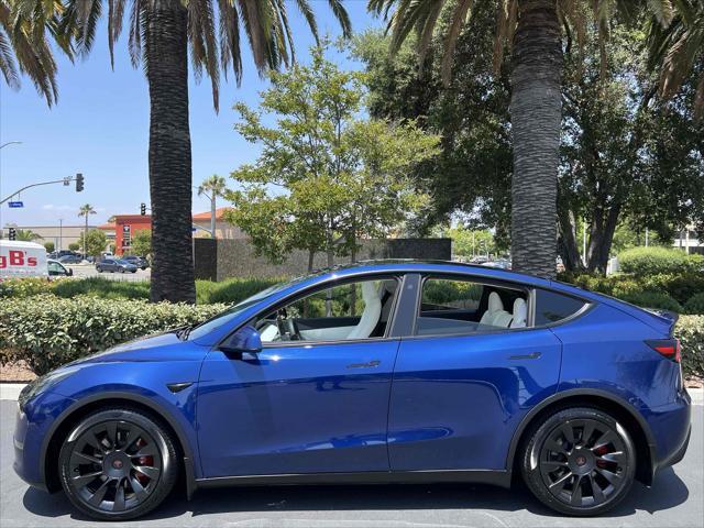 used 2021 Tesla Model Y car, priced at $26,500