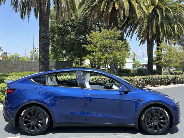 used 2021 Tesla Model Y car, priced at $26,500