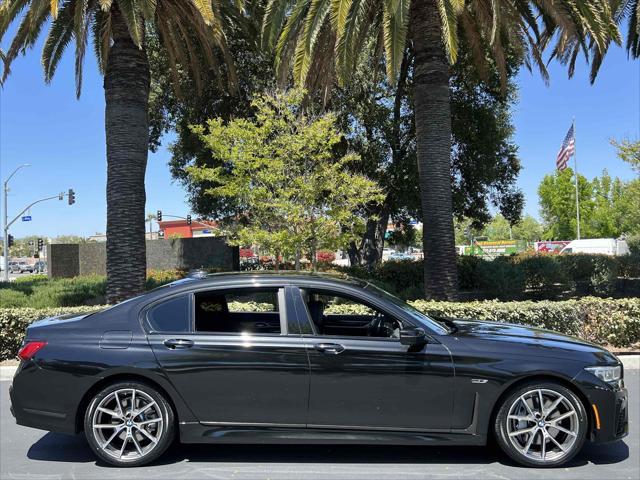used 2022 BMW 745e car, priced at $41,990