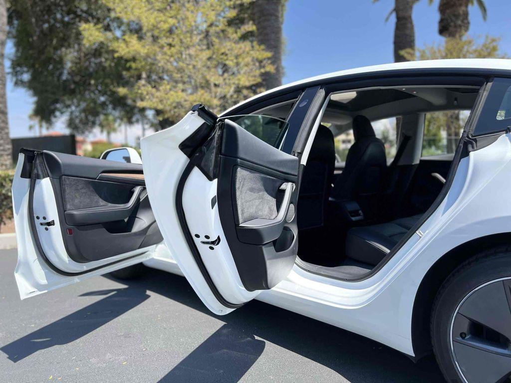 used 2022 Tesla Model 3 car, priced at $27,999