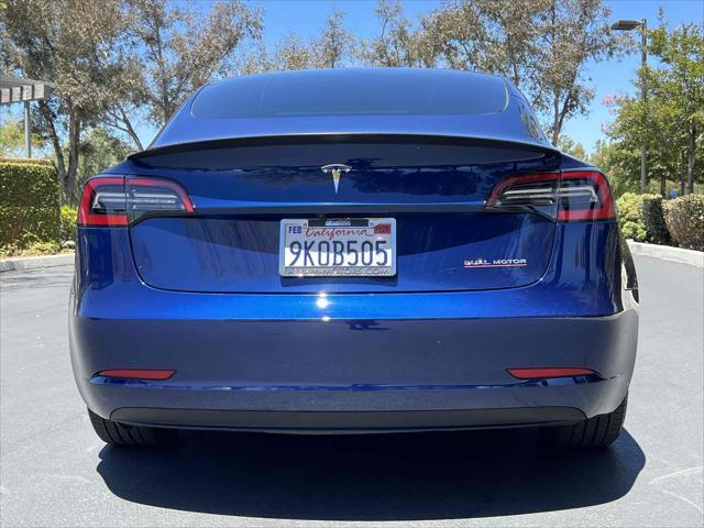 used 2023 Tesla Model 3 car, priced at $19,500