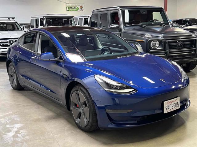 used 2023 Tesla Model 3 car, priced at $19,500